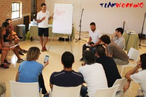 Teamwork moment during a Corporate Song creation